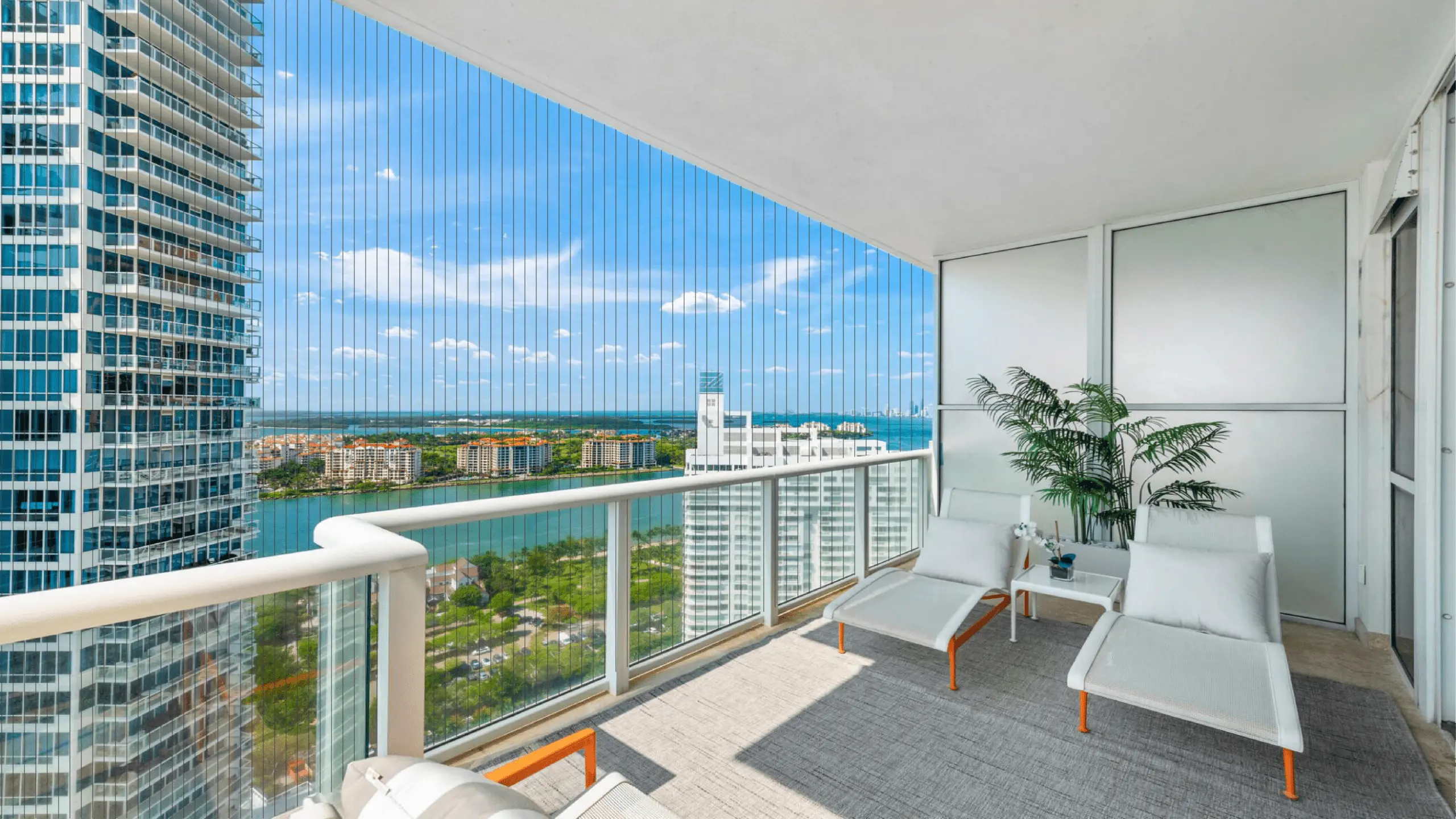 Stainless steel invisible grill fitted on a high-rise balcony